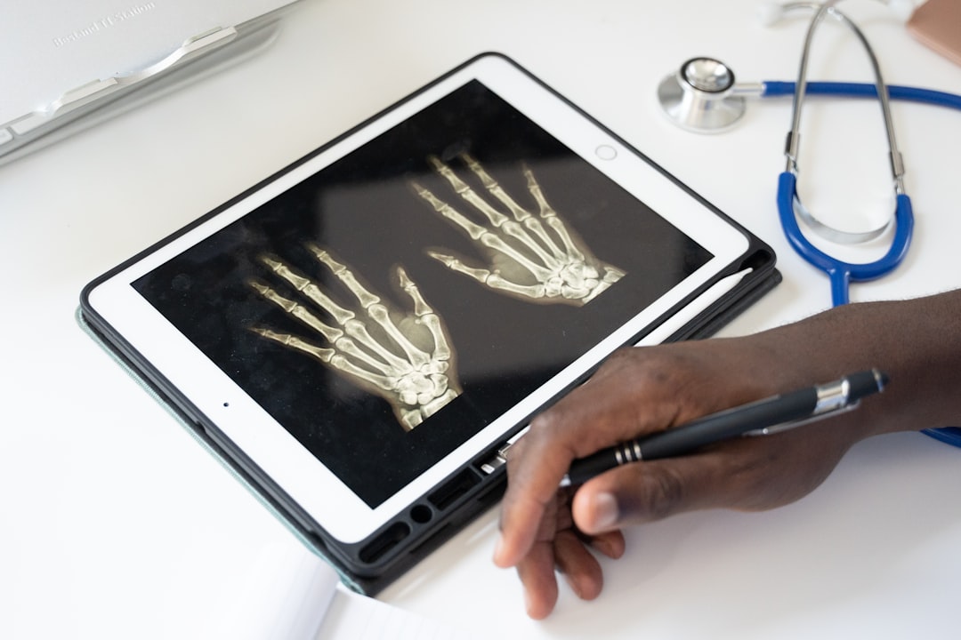 a-person-holding-a-tablet-chynmuycjh8